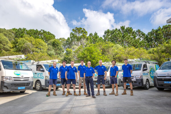 North Lakes and Surrounds Electrical team in front of Vans