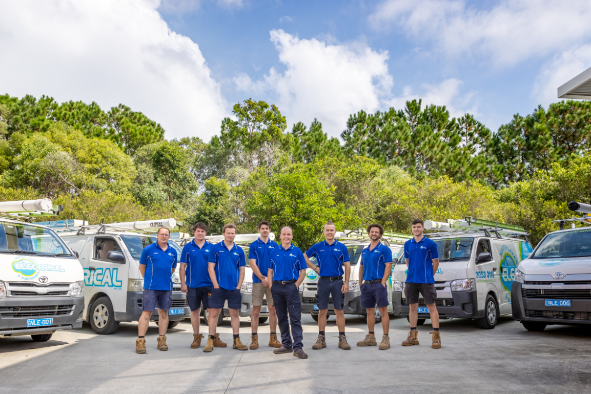 North Lakes and Surrounds Electrical team in front of Vans