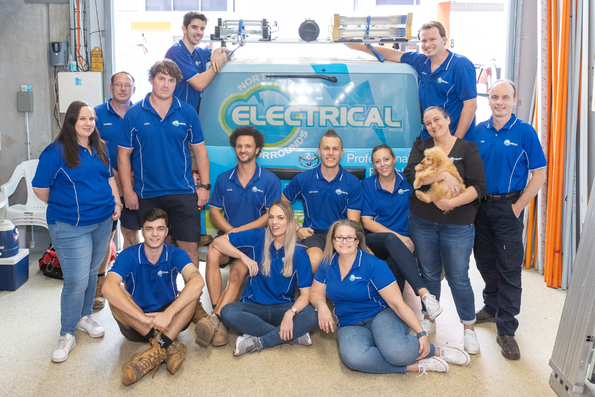 The team at North Lakes & Surrounds Electrical in front of the work van