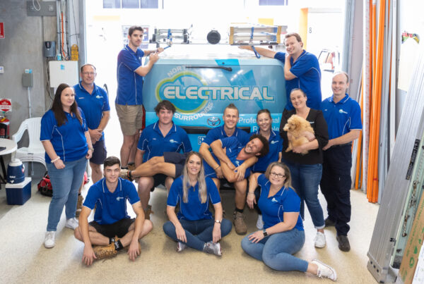 The team at North Lakes & Surrounds Electrical in front of the work van